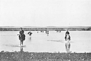 Fording the Tigris below Diyarbekr.