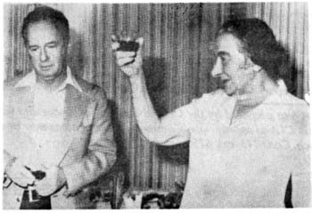 Outgoing prime minister Golda Meir toasts her successor, Yitzhak Rabin.